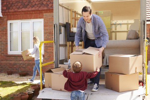 Furniture being carefully moved from a Denmarkhill flat