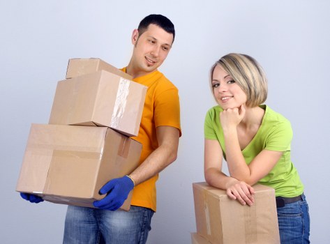 Packed boxes and furniture ready for a house removal in Denmarkhill