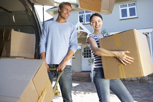 Packed boxes and furniture loaded into a removal van